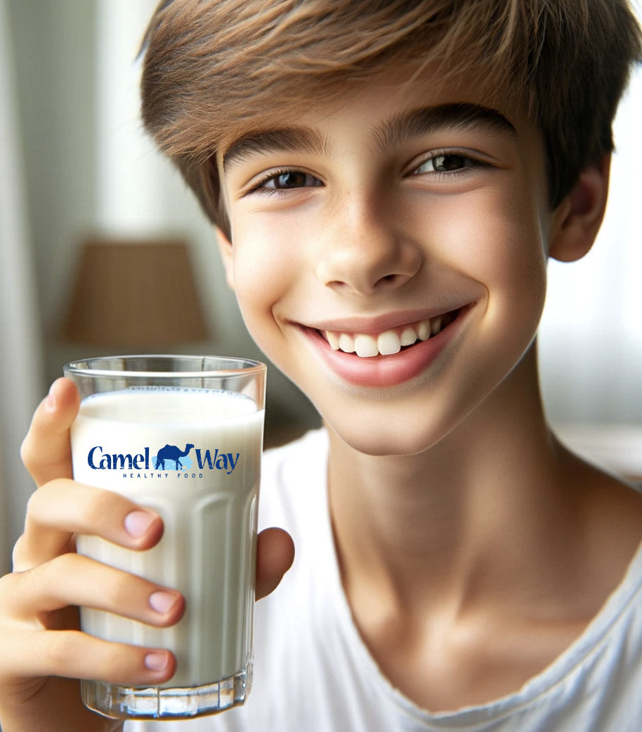 A happy teenager drinking camel milk after battling lactose intolerance